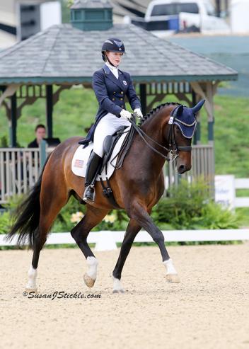 Catherine Chamberlain and Avesto van Weltevreden win the Young Rider division at the U.S. Dressage Festival of Champions 
