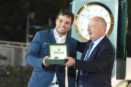 Daniel Bluman recieves his Rolex watch from  Stewart Wicht, CEO & President of Rolex USA. Photo by Josh Walker for The Chronicle of the Horse