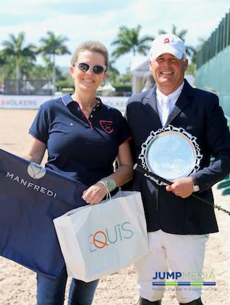 David Raposa is presented with the “Best Presented Horse” Award and prizes from Manfredi Equestrian by Elena Couttenye of Equis Boutique during Week 6 at the Winter Equestrian Festival. 
