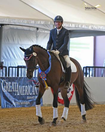 David Wightman of Murrieta, Cal. finally had a chance to smile after his five-year-old Oldenburg gelding Hotshot AF won the Great American/USDF Region 7 First Level Open Championship on an impressive score of 74.044%