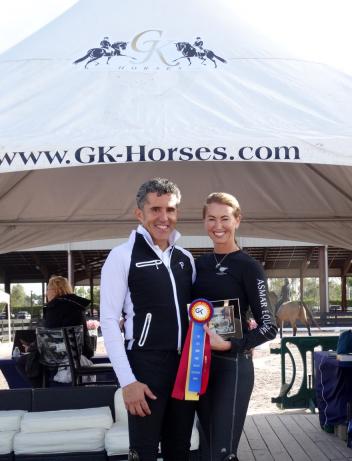 PJ Rizvi and Cesar Parra of GK Elite Sport receiving the GK Elite Adult Amateur Achievement Award during week 3 of the Adequan Global Dressage Festival.