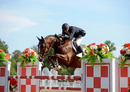 Harold Chopping and Basje on their way to $25,000 Brook Ledge Grand Prix win. 