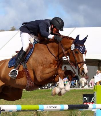 Harold Chopping and Basje on their way to a $25,000 SmartPak Grand Prix win. 