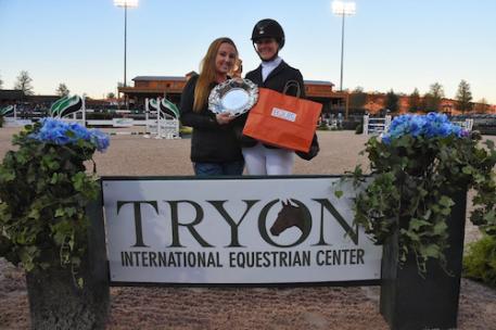Heather Caristo-Williams accepted the Equis Boutique “Best Presented Horse” Award from Alex West of Equis Boutique during during Tryon Fall 5.