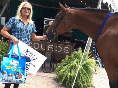 HJ Noteworthy, with rider Holly Shepherd, wins the Omega Alpha Healthy Horse Award at the Summer in the Rockies show series at the Colorado Horse Park 