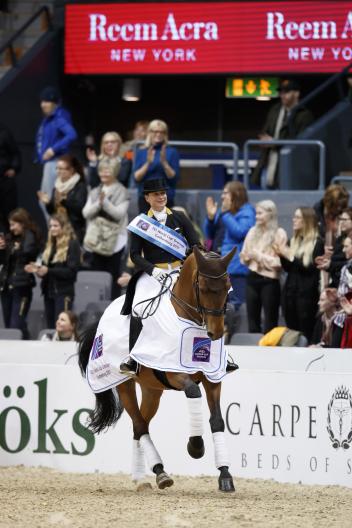 Germany´s Isabell Werth and Emilio celebrating victory in the eighth leg of the FEI World Cup Dressage Western European League series at Gothenburg, Sweden. 