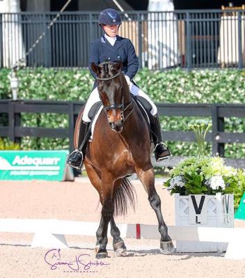 Jennifer Baumert breaks the 70% barrier on Handsome at prix st. georges.
