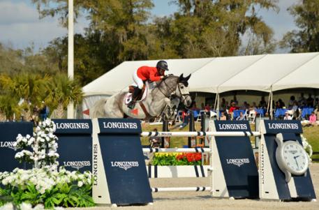 Lauren Hough and Cornet of Team U.S.A in the Furusiyya FEI Nations Cup CSIO4*, presented by Edge Brewing Barcelona at HITS Post Time Farm in Ocala, Florida. 