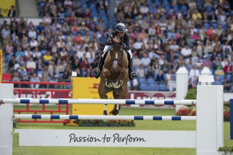 : French rider Penelope Leprevost galloped to victory with Flora de Mariposa in the first Team and Individual qualifier at the FEI European Jumping Championships 2015 in Aachen, Germany today. (FEI/Dirk Caremans)  