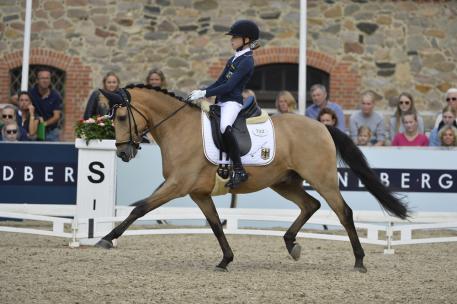 Germany’s Lucie-Anouk Baumgürtel and Massimiliano 3, gold individual and freestyle dressage and part of the German gold medal winning team at the FEI European Championships for Ponies 2016 (FEI/Sanne Kolind)