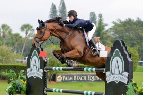 At only 15 years of age, Lucy Deslauriers of the United States topped the  2015 Artisan Farms Under 25 Grand Prix Series riding Hester.  