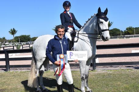 Dr. Cesar Parra was pleased to present the Piaffe Performance Adult Amateur Achievement Award to Michele Roark, riding her horse Cesar HHC