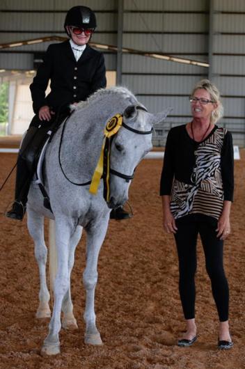 Olwen Busch, a former member of the Northeast Florida Equestrian Society Board of Directors,