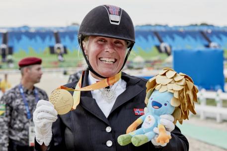 Norway’s Ann Cathrin Lübbe wins the first Para-Equestrian medal at Rio 2016, taking gold in the Grade III Individual test on Donatello (Liz Gregg/FEI)
