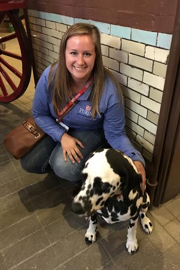 Claire Hoffman and Clyde visit at the Budweiser Brewery Stables
