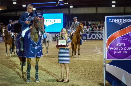 Winners Samuel Parot (CHI) and Atlantis with Jillian Percella of Longines