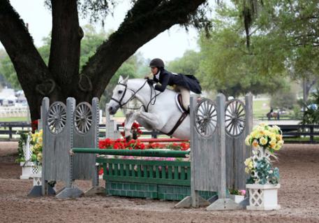 Skyler Fields and Echo on their way to a $5,000 Platinum Performance Hunter Prix win. 