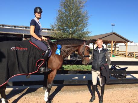 Stephanie Hartigan aboard Clever, with her husband Glenn Hartigan, won a blue ribbon in the Premier Equestrian 0.80m Low Jumper class at Tryon International Equestrian Center