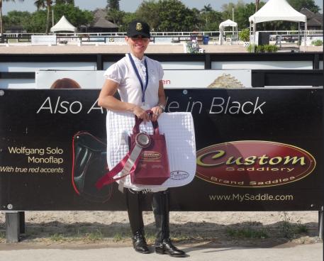 Susie Dutta wins the Custom Saddlery MVR Award at the 2016 Adequan Global Dressage Festival 