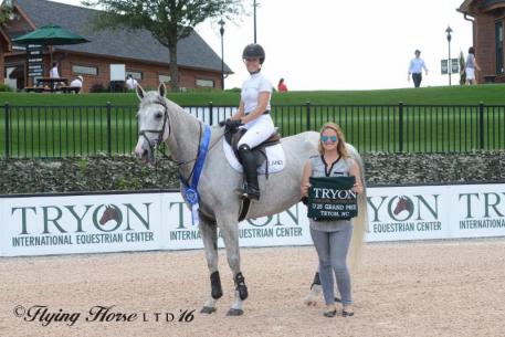 Taylor Land and Nepal in their presentation ceremony with Maddy Stover of TIEC.