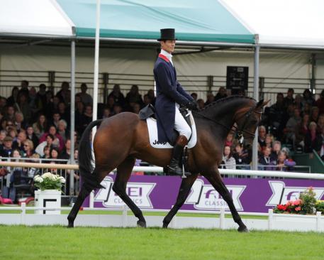 The race is on: William Fox-Pitt (GBR) and Fernhill Pimms draw level with Michael Jung (GER) and FischerRocana FST after Dressage at the Land Rover Burghley Horse Trials (GBR), sixth and final leg of the FEI Classics™ 2014/2015. (Photo: Trevor Meeks/FEI)
