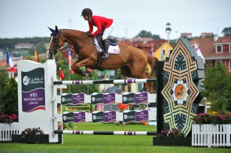 Ashlee Bond and Chela LS helped Team USA secure a sensational back-to-back Furusiyya FEI Nations Cup™ Jumping 2014 victory at the sixth leg of the Europe Division 2 series in Gijon, Spain today. Photo: FEI/Herve Bonnaud.