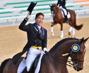 Young-shik Hwang of the Republic of South Korea wins Individual Dressage Gold at the 2014 Asian Games (Photo: HorseMovieThailand)  