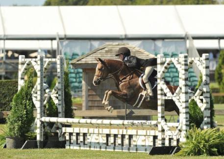 Caroline Passarelli rode Bit Of Love to win the $2,500 Pony Hunter Classic and the Grand Pony Hunter Championship at the Hampton Classic. (Shawn McMillen photo)