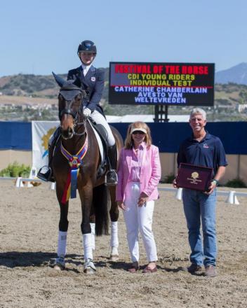 Catherine Chamberlain accepts congratulations from FEI judge Brenda Minor & USEF Youth Coach George Williams. (Photo: Terri Miller)