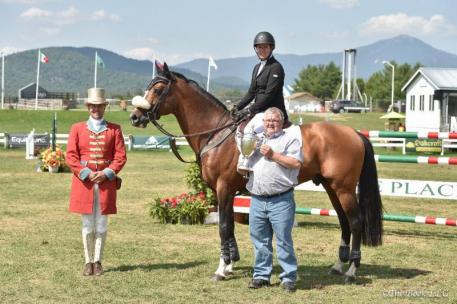 Christine McCrea receives the Richard and Diana Feldman Perpetual Challenge Trophy for Excellence (Photo: The Book LLC)