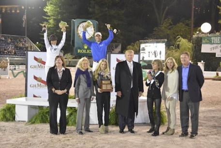 Team Captains Georgina Bloomberg and Kent Farrington in their presentation with Kim McCullough, Vice President of Marketing Jaguar Land Rover North America, Terry Allen Kramer, Paige Bellissimo, Mr. Donald Trump, Amy Klein of Suncast, and Katherine and Mark Bellissimo. Photo Credit Kit Houghton/Rolex