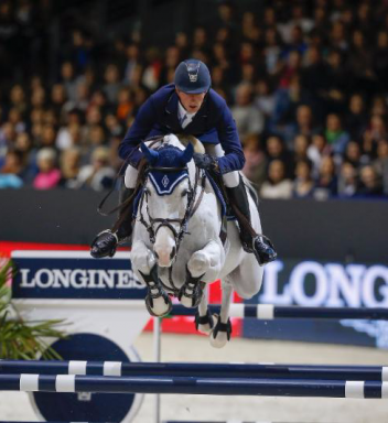 Defending champions Daniel Deusser of Germany and Cornet d'Amour (c) FEI / Dirk Caremans