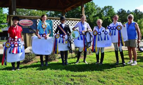 Division Champions at the Dressage4Kids 2015 Atlanta Youth Dressage Festival win Custom Saddlery saddle pads (Photo: Marc Mesa)