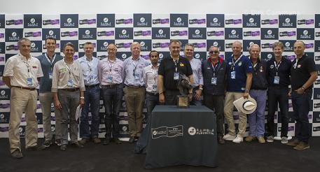 Spain’s Marco Fuste (centre) is joined by the 13 other Chef d’Equipes whose teams will line out tomorrow at the Real Club de Polo in Barcelona, Spain when the Furusiyya FEI Nations Cup™ Jumping Final 2014 gets underway. (FEI/Dirk Caremans)
