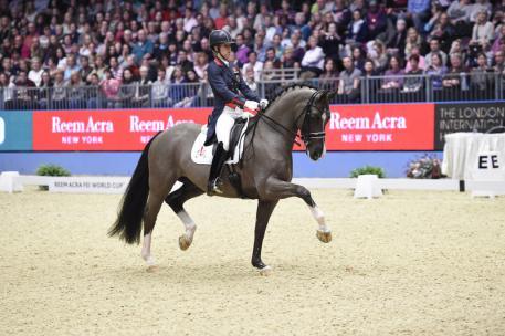 Great Britain’s Charlotte Dujardin and Valegro produced a performance close to perfection when winning tonight’s fifth leg of the Reem Acra FEI World Cup™ Dressage 2014/2015 Western European League at Olympia in London (GBR) with yet another world-record-breaking score. (FEI/Kit Houghton)