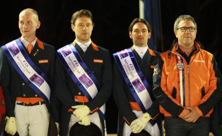The Dutch team of Diederik van Silfhout, Laurens van Lieren and Tommie Visser pictured with Chef d’Equipe Wim Ernes following victory at the second leg of the FEI Nations Cup™ Dressage 2014 pilot series at Vidauban, France. (FEI/Rui Pedro Godinho)