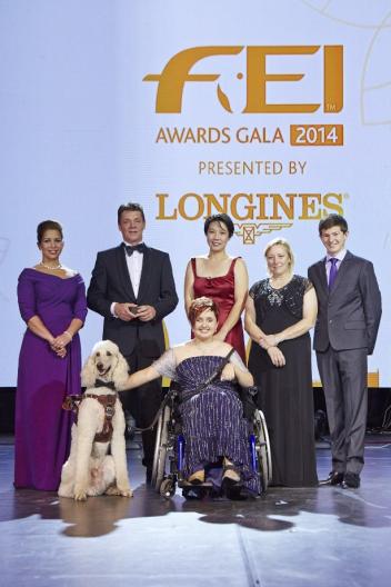 Equestrian heroes were celebrated tonight at the glittering FEI Awards 2014, the “Oscars of the equestrian world”, presented by Longines in Baku’s fabulous Buta Palace (left to right): HRH Princess Haya, Jeroen Dubbeldam (NED), Melissa Tan (SIN) chairman of equine therapy centre Equal Ark, Jackie Potts (GBR), Lambert Leclezio (MRI) with (centre) Sydney Collier (USA) and her service dog Journey. (FEI/Liz Gregg)