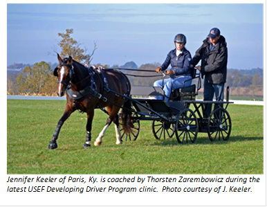 Jennifer Keeler of Paris, KY is coached by Thorsten Zarembowicz during the USEF Developing Driver Program clinic. Photo courtesy of J. Keeler