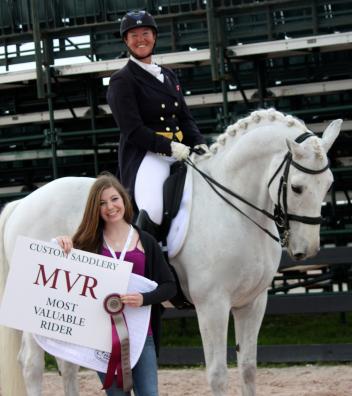 Jacqueline Brooks, on D Niro, is presented with the Custom Saddlery Most Valuable Rider Award by April Leonard during week one of the 2015 Adequan Global Dressage Festival 