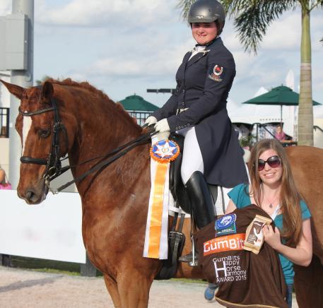 Tanya Strasser-Shostak (pictured on Deluxe Tyme) was awarded the GumBits Happy Horse Harmony Award at the 2015 Adequan Global Dressage Festival