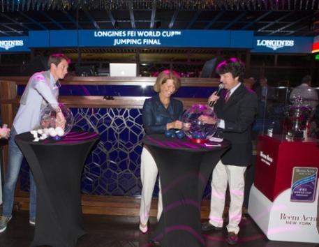 Conducting the draw for tomorrow’s opening competition of the Longines FEI World Cup™ Jumping 2015 Final at the Hakkasan nightclub at the MGM hotel in Las Vegas: (L to R) defending champion Germany’s Daniel Deusser, 2012 champion America’s Beezie Madden and commentator Peter Doubleday. (FEI/Dirk Caremans)