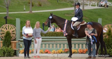 Caitlin Malloy Brennan, owner Shelly Ferall, and groom with Keirstin Johnsen and Hennepin during their winner's presentation. Photo by Sarah Latterner