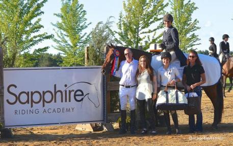 Doug Boyd, Mimi Rothchild, Anna Kubiak and Ashley Hill with Maria Rasmussen and Memorable. Photo by Chicago Equestrian.