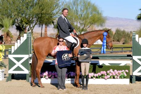 John Bragg and Laura Strasburg's Social hour take the blue for the third time Friday, February 6, in the 2015 HITS Desert Circuit in Thermal, California.(c) ESI Photography