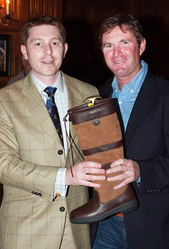 Phillip Dutton (right) receives his Dubarry boots from Danny Hulse. (Michelle Dunn photo)
