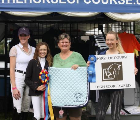 With a score of 80.455%, pony Prince Z and Hannah Beaulieu earned The Horse of Course High Score Award at the 2015 AGDF (left to right: Trainer Brittany Fraser, young rider Farah Rizvi, Beth Haist of The Horse of Course, and young rider Hannah Beaulieu)