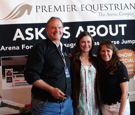 “Premier Equestrian” Adreinne Lyle (center) with Mark Neihart (left), CEO of Premier Equestrian, and Heidi Zorn (right), President of Premier Equestrian, at Premier’s booth at the 2015 Reem Acra FEI World Cup Dressage and Longines FEI World Cup Jumping Finals