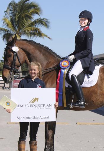 Ayden Uhlir (riding Sjapoer) is presented with the Premier Equestrian Sportsmanship Award at the Adequan Global Dressage Festival 
