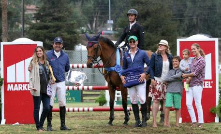 Rodrigo Lambre celebrates the grand prix win with family and friends. Photo courtesy of CapturedMomentPhoto.com