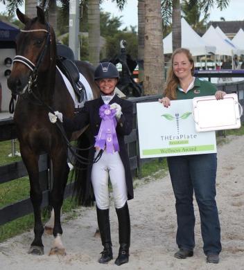 Something Special C and Adrienne Pot (left) wins the TheraPlate Award at the Adequan Global Dressage Festival